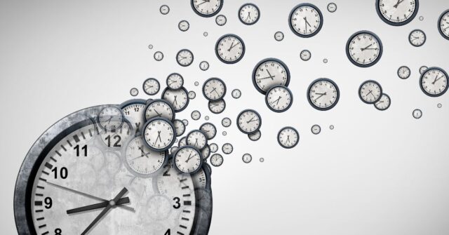 One large clock face in the lower left of the image with small clocks breaking off toward the top right all showing different times as to indicate time tracking.