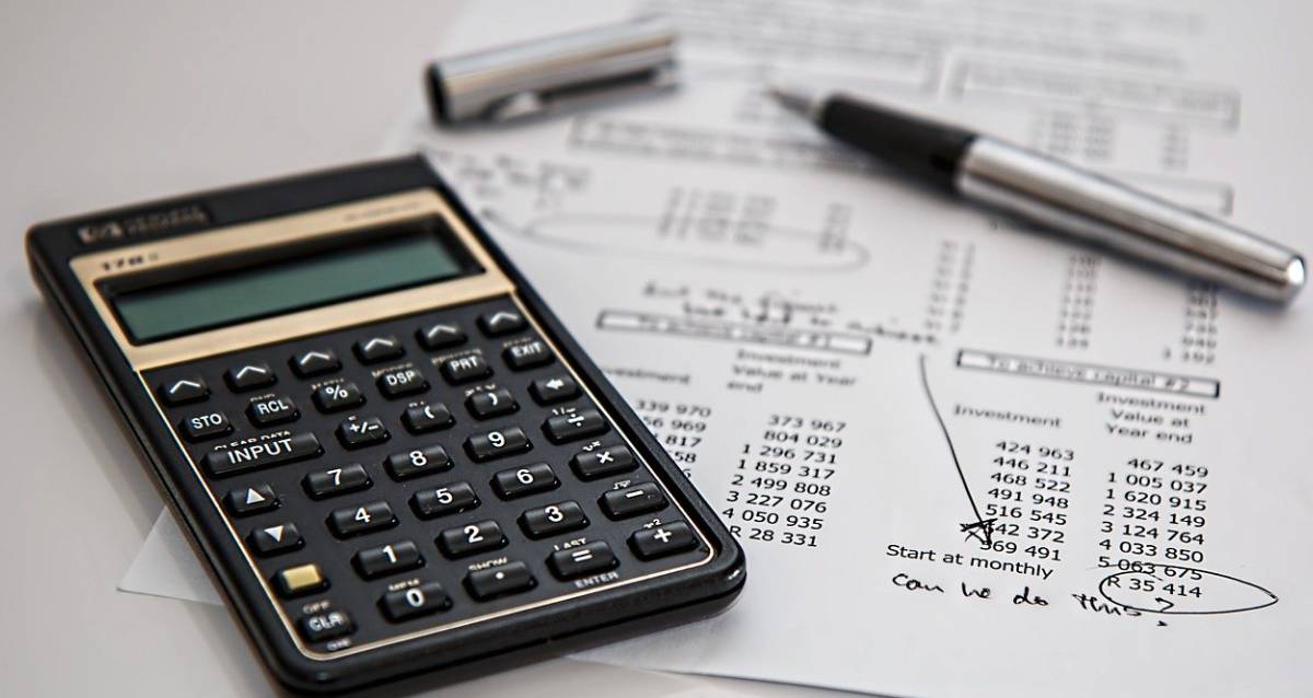 A calculation and various paper used to calculate taxes.